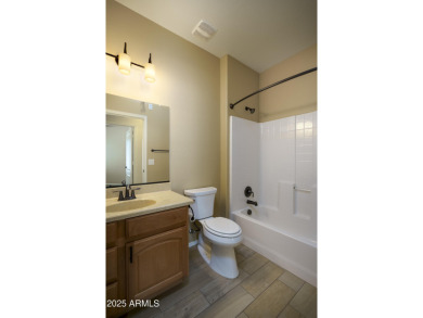 Welcome to this cozy unit with warm welcoming wood finished tile on Sunland Springs Golf Course  in Arizona - for sale on GolfHomes.com, golf home, golf lot