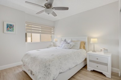WELCOME TO THIS SPACIOUS, ATTRACTIVE CORNER, TOP FLOOR  CONDO on Poinciana Golf Club in Florida - for sale on GolfHomes.com, golf home, golf lot
