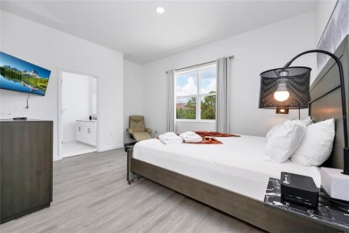 This beautifully designed 4-bedroom, 4-bathroom townhouse plus a on Reunion Resort Golf Course in Florida - for sale on GolfHomes.com, golf home, golf lot