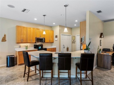 This immaculately clean and crisp 2-bedroom, 2-bath home (1,530 on Lake Ashton Golf Club in Florida - for sale on GolfHomes.com, golf home, golf lot