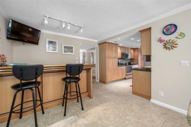 This updated home offers one of the most stunning views in all on Highland Lakes Executive Golf Course in Florida - for sale on GolfHomes.com, golf home, golf lot