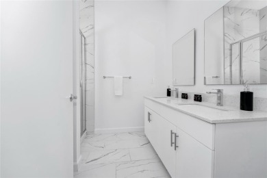 This beautifully designed 4-bedroom, 4-bathroom townhouse plus a on Reunion Resort Golf Course in Florida - for sale on GolfHomes.com, golf home, golf lot