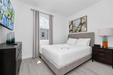 This beautifully designed 4-bedroom, 4-bathroom townhouse plus a on Reunion Resort Golf Course in Florida - for sale on GolfHomes.com, golf home, golf lot