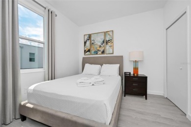 This beautifully designed 4-bedroom, 4-bathroom townhouse plus a on Reunion Resort Golf Course in Florida - for sale on GolfHomes.com, golf home, golf lot