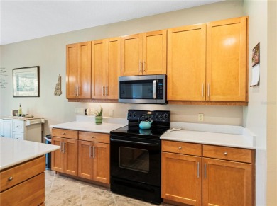 This immaculately clean and crisp 2-bedroom, 2-bath home (1,530 on Lake Ashton Golf Club in Florida - for sale on GolfHomes.com, golf home, golf lot