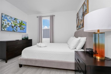 This beautifully designed 4-bedroom, 4-bathroom townhouse plus a on Reunion Resort Golf Course in Florida - for sale on GolfHomes.com, golf home, golf lot
