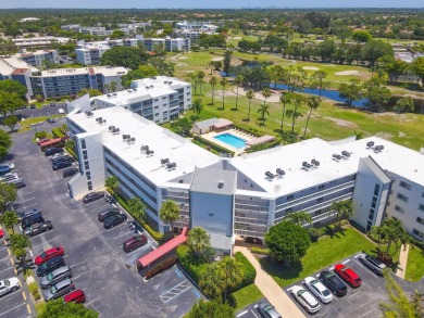 WELCOME TO THIS SPACIOUS, ATTRACTIVE CORNER, TOP FLOOR  CONDO on Poinciana Golf Club in Florida - for sale on GolfHomes.com, golf home, golf lot