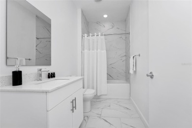 This beautifully designed 4-bedroom, 4-bathroom townhouse plus a on Reunion Resort Golf Course in Florida - for sale on GolfHomes.com, golf home, golf lot