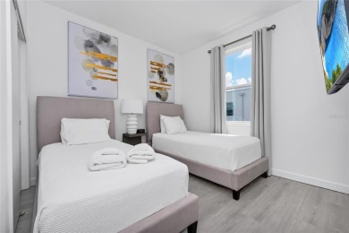 This beautifully designed 4-bedroom, 4-bathroom townhouse plus a on Reunion Resort Golf Course in Florida - for sale on GolfHomes.com, golf home, golf lot