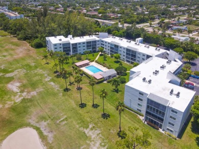 WELCOME TO THIS SPACIOUS, ATTRACTIVE CORNER, TOP FLOOR  CONDO on Poinciana Golf Club in Florida - for sale on GolfHomes.com, golf home, golf lot
