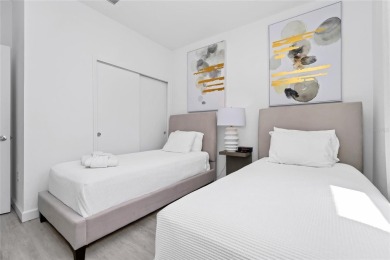 This beautifully designed 4-bedroom, 4-bathroom townhouse plus a on Reunion Resort Golf Course in Florida - for sale on GolfHomes.com, golf home, golf lot