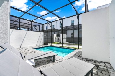 This beautifully designed 4-bedroom, 4-bathroom townhouse plus a on Reunion Resort Golf Course in Florida - for sale on GolfHomes.com, golf home, golf lot
