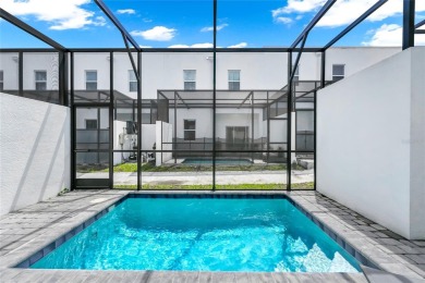 This beautifully designed 4-bedroom, 4-bathroom townhouse plus a on Reunion Resort Golf Course in Florida - for sale on GolfHomes.com, golf home, golf lot