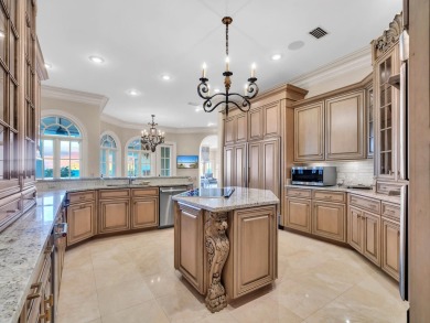 This stunning Waterfront Bay Estate is a rare gem nestled within on Kelly Plantation Golf Club in Florida - for sale on GolfHomes.com, golf home, golf lot