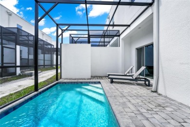 This beautifully designed 4-bedroom, 4-bathroom townhouse plus a on Reunion Resort Golf Course in Florida - for sale on GolfHomes.com, golf home, golf lot