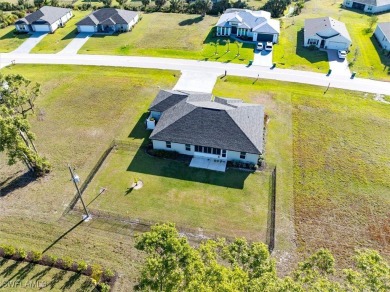 Better than new!! No flood insurance required for this three car on Burnt Store Golf Club in Florida - for sale on GolfHomes.com, golf home, golf lot