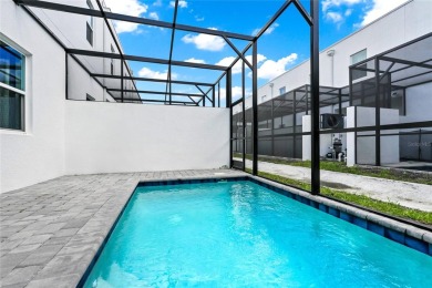 This beautifully designed 4-bedroom, 4-bathroom townhouse plus a on Reunion Resort Golf Course in Florida - for sale on GolfHomes.com, golf home, golf lot