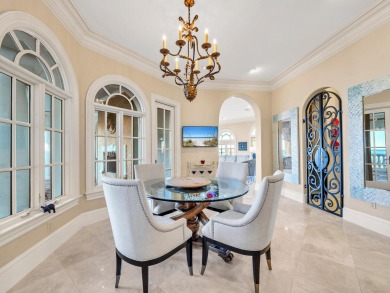 This stunning Waterfront Bay Estate is a rare gem nestled within on Kelly Plantation Golf Club in Florida - for sale on GolfHomes.com, golf home, golf lot