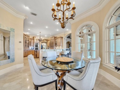 This stunning Waterfront Bay Estate is a rare gem nestled within on Kelly Plantation Golf Club in Florida - for sale on GolfHomes.com, golf home, golf lot