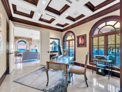 This stunning Waterfront Bay Estate is a rare gem nestled within on Kelly Plantation Golf Club in Florida - for sale on GolfHomes.com, golf home, golf lot