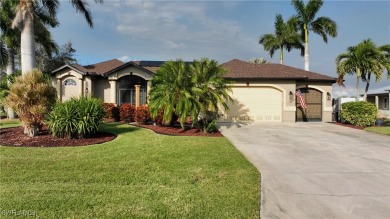 This impeccably maintained and beautifully designed waterfront on Burnt Store Golf Club in Florida - for sale on GolfHomes.com, golf home, golf lot