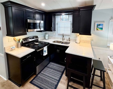 Looking for a winter retreat or full-time residence, check out on The Great Outdoors Golf and Country Club in Florida - for sale on GolfHomes.com, golf home, golf lot