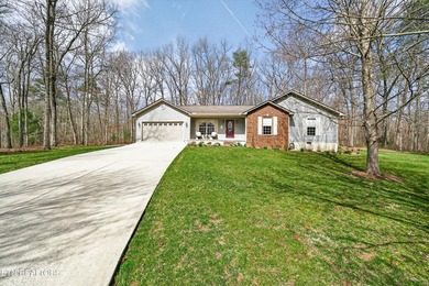 Remarkable property on a quiet circle in Lake Tansi Village, in on Lake Tansi Village Country Club in Tennessee - for sale on GolfHomes.com, golf home, golf lot