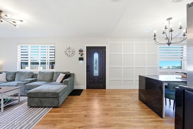 Experience coastal living at its finest in this beautifully on Jacksonville Beach Golf Course in Florida - for sale on GolfHomes.com, golf home, golf lot