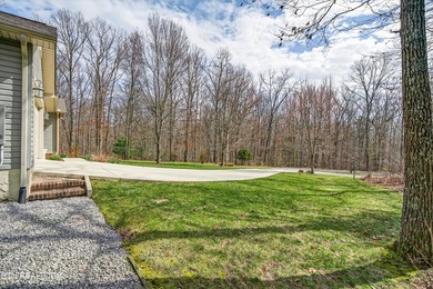 Remarkable property on a quiet circle in Lake Tansi Village, in on Lake Tansi Village Country Club in Tennessee - for sale on GolfHomes.com, golf home, golf lot