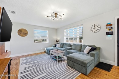 Experience coastal living at its finest in this beautifully on Jacksonville Beach Golf Course in Florida - for sale on GolfHomes.com, golf home, golf lot