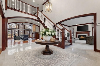 From the moment you arrive, this custom home in the gated Sand on Sand Creek Golf and Country Club  in Indiana - for sale on GolfHomes.com, golf home, golf lot