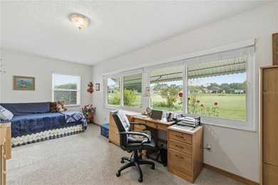 Welcome to a stunning home where comfort meets elegance in the on On Top of the World Golf Course in Florida - for sale on GolfHomes.com, golf home, golf lot