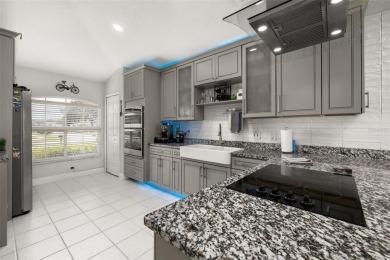 Welcome to this stunning 2-story pool home with 4 bedrooms, 3 on Highlands Reserve Golf Club in Florida - for sale on GolfHomes.com, golf home, golf lot