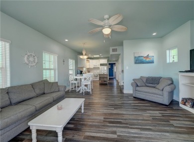 Come and enjoy this fun, colorful beach house in Mustang Royale on Palmilla Beach Golf Club in Texas - for sale on GolfHomes.com, golf home, golf lot
