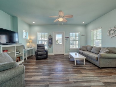 Come and enjoy this fun, colorful beach house in Mustang Royale on Palmilla Beach Golf Club in Texas - for sale on GolfHomes.com, golf home, golf lot