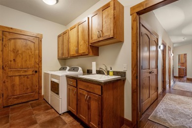 Immaculate one-level home overlooking the 5th fairway at the on Canyon River Golf Club in Montana - for sale on GolfHomes.com, golf home, golf lot