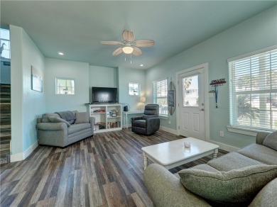 Come and enjoy this fun, colorful beach house in Mustang Royale on Palmilla Beach Golf Club in Texas - for sale on GolfHomes.com, golf home, golf lot