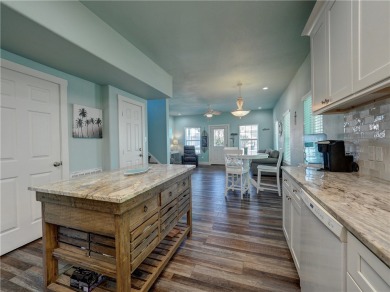 Come and enjoy this fun, colorful beach house in Mustang Royale on Palmilla Beach Golf Club in Texas - for sale on GolfHomes.com, golf home, golf lot