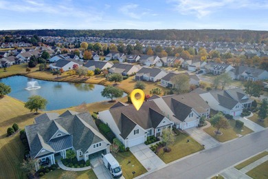 Pond living in this spacious, turn-key home in Del Webb Cane Bay on Cypress Point Par 3 in South Carolina - for sale on GolfHomes.com, golf home, golf lot