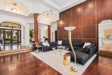 This exceptional lakeside estate blends sophistication, comfort on Bocaire Country Club in Florida - for sale on GolfHomes.com, golf home, golf lot