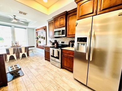 Income-Producing Waterfront Luxury! This channel-front townhome on South Padre Island Golf Club in Texas - for sale on GolfHomes.com, golf home, golf lot
