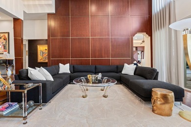 This exceptional lakeside estate blends sophistication, comfort on Bocaire Country Club in Florida - for sale on GolfHomes.com, golf home, golf lot