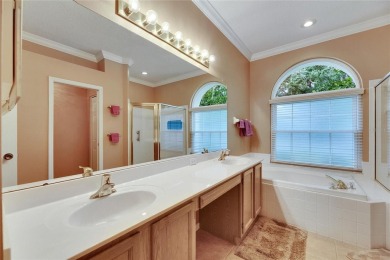 Welcome to luxury living at its finest in the highly sought on Hunters Green Country Club in Florida - for sale on GolfHomes.com, golf home, golf lot