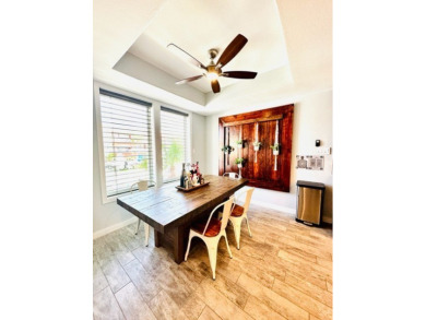 Income-Producing Waterfront Luxury! This channel-front townhome on South Padre Island Golf Club in Texas - for sale on GolfHomes.com, golf home, golf lot