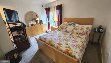 For your downsizing pleasure---a perfect corner unit away from on Leisure World Golf Club in Maryland - for sale on GolfHomes.com, golf home, golf lot