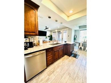 Income-Producing Waterfront Luxury! This channel-front townhome on South Padre Island Golf Club in Texas - for sale on GolfHomes.com, golf home, golf lot