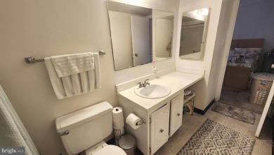 For your downsizing pleasure---a perfect corner unit away from on Leisure World Golf Club in Maryland - for sale on GolfHomes.com, golf home, golf lot