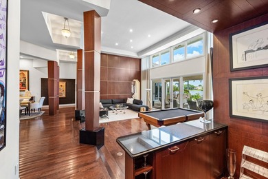 This exceptional lakeside estate blends sophistication, comfort on Bocaire Country Club in Florida - for sale on GolfHomes.com, golf home, golf lot