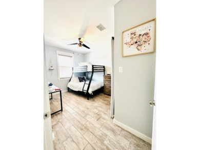 Income-Producing Waterfront Luxury! This channel-front townhome on South Padre Island Golf Club in Texas - for sale on GolfHomes.com, golf home, golf lot