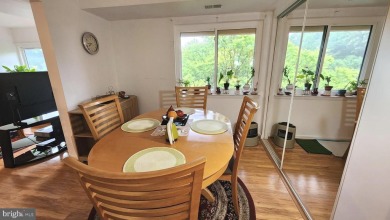 For your downsizing pleasure---a perfect corner unit away from on Leisure World Golf Club in Maryland - for sale on GolfHomes.com, golf home, golf lot